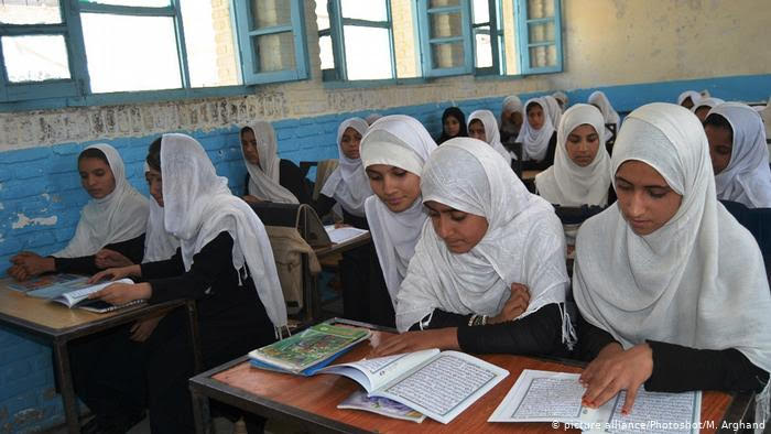 Afghanistan's government has distanced itself from a plan to ban girls from singing after women's rights activists opposed education officials for promoting a "Taliban-like" policy.