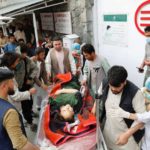 An injured woman is transported to a hospital after Saturday's blast in Kabul. (Mohammad Ismail/Reuters)