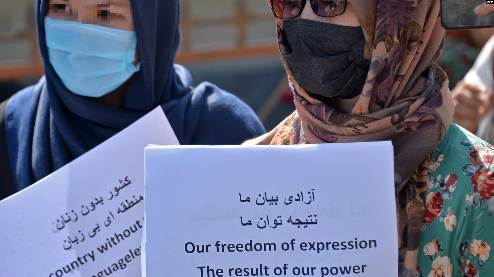 Afghan women take part in a protest for their rights under the Taliban in downtown Kabul on September 3.