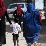 In another blow to women's rights, Afghan women will only be able to travel short distances unaccompanied.(AFP: Sajjad Hussain)