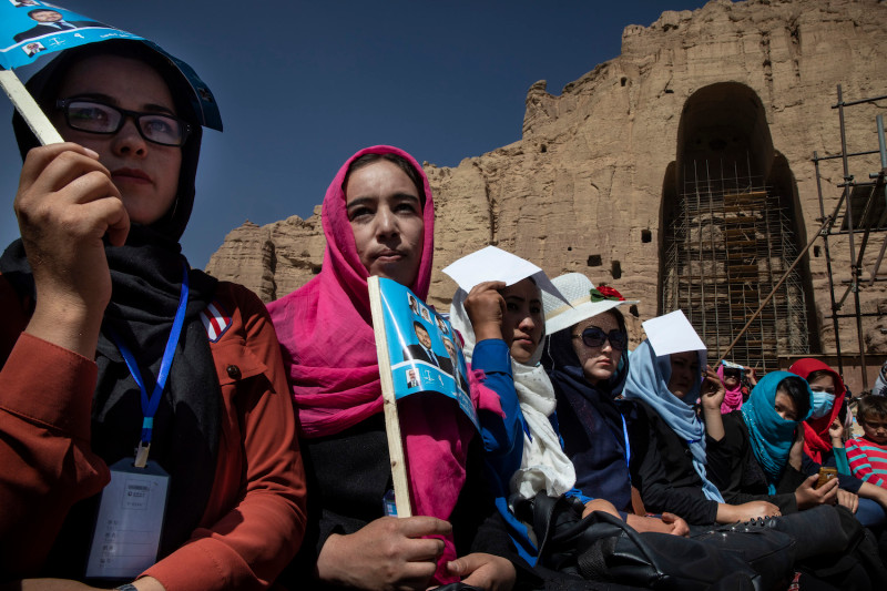 Afghan women listen to speeches during the final campaign rally for Abdullah Abdullah in Bamiyan, Afghanistan, on September 25, 2019. PAULA BRONSTEIN/GETTY IMAGES