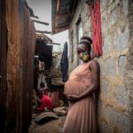 A woman 8 months pregnant in Kibera Slums Nairobi. Due to the COVID-19 lockdown, threats have risen on marginalized people especially the teenagers living in high poverty communities. Photo by Donwilson Odhiambo / SOPA Images/Sipa USA