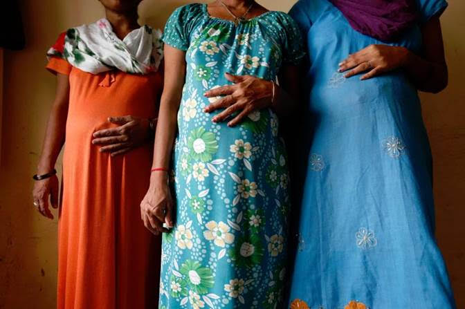 More than 30 Cambodian women paid to carry babies for clients have been released on bail after agreeing to keep the children. — Reuters picture