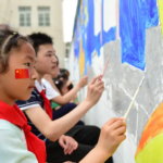 Students paint on a wall ahead of the Children's Day in Hefei, in China's eastern Anhui province. (AFP/Getty Images)