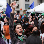 Women celebrate after Colombia's constitutional court voted to decriminalize abortion until 24 weeks of gestation, in Bogota, Colombia, on Feb. 21, 2022. (Luisa Gonzalez/Reuters)