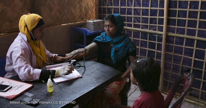 A woman receives health counseling at a women's center in Balukhali camp in Cox's Bazar, Bangladesh. Photo by: Allison Joyce / UN Women / CC BY-NC-ND