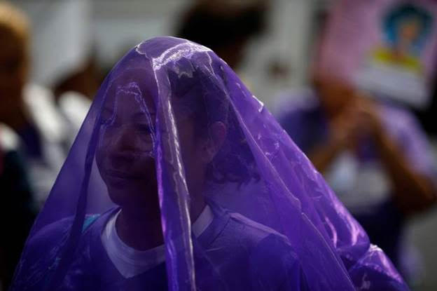 A woman wears a veil during a protest to commemorate the U.N. International Day for the Elimination of Violence Against Women at the Attorney General's Office in San Salvador, El Salvador November 26, 2018. REUTERS/Jose Cabezas