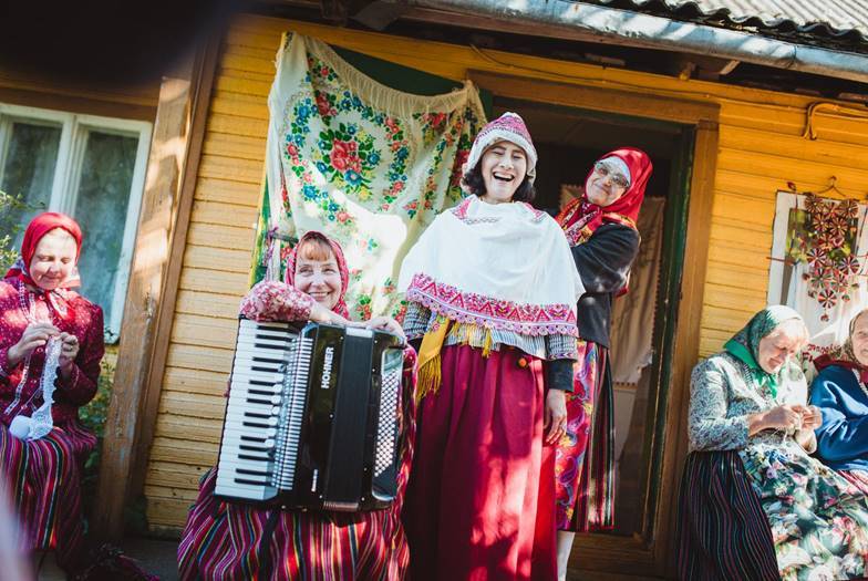 A group of women give a folklore presentation to tourists about Kihnu's ancient, unique culture—largely preserved by women, and which attracts visitors from Estonia and abroad. PHOTOGRAPH BY FABIAN WEISS