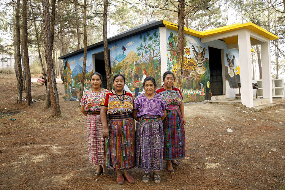 Rosalina Tuyuc Velásquez, (second from left) a human rights activist and co-founder of a widows association in the municipality of Comalapa, Guatemala has spearheaded the construction of a memorial for victims of the conflict in Comalapa. It’s called the “Center for the Historical Memory of Women”. Photo: UN Women/Ryan Brown