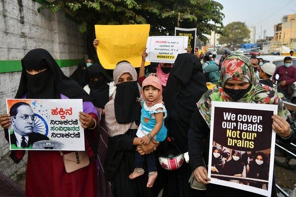 Muslim women demonstrating in Bangalore, in the Indian state of Karnataka, on Monday. Credit...Manjunath Kiran/Agence France-Presse — Getty Images