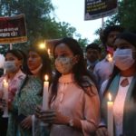 Activists hold a candlelight march protesting the alleged rape and murder of a 9-year-old Dalit girl in New Delhi, India on August 4, 2021. © 2021 Pankaj Nangia/Anadolu Agency via Getty Images