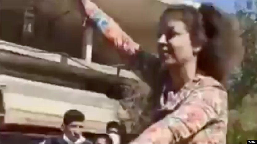 Hard-liners have taken to the streets of the conservative Iranian city of Najafabad to condemn this woman for riding a bicycle without wearing a veil.