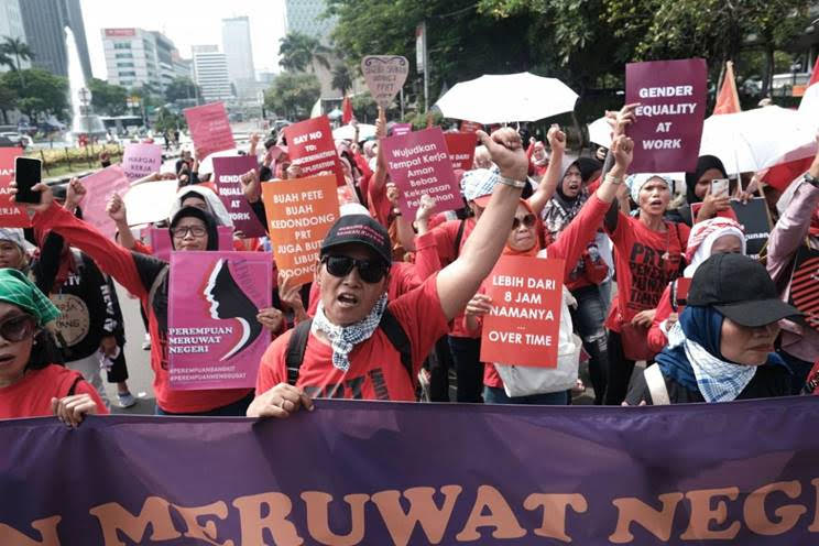 Women from all walks of life taking to the streets during the 'Perempuan Meruwat Negeri' (Women Heal the Nation) rally in Central Jakarta on Sunday (Dec 22). The rally was held to reclaim Dec 22 as women's awakening day instead of Mother's Day as declared by first president Soekarno. - Jakarta Post/ANN