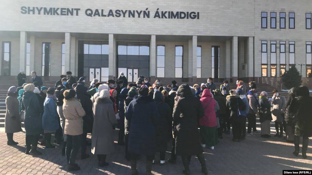 Women gather outside the Shymkent administration building on November 23.