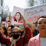 People attend a rally in front of Kyrgyzstan's interior ministry demanding the resignation of its leadership after the murder of kidnapped bride Aizada Kanatbekova amid alleged lack of action by the police, in Bishkek, Kyrgyzstan April 8, 2021. REUTERS/Vladimir Pirogov