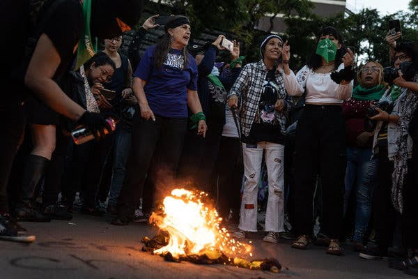 At a recent protest, women in Mexico City burned the flag of a youth soccer team that had made fun of a song that has become an international anthem of the new wave of feminist activism. Credit-Toya Sarno Jordan for The New York Times