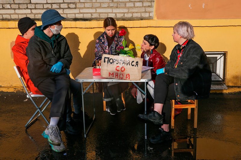 The art performance Quarrel With Me, shown in St. Petersburg in May, was organized by artist and activist Katrin Nenasheva, second from right, to address the topic of domestic violence during Russia’s lockdown. In the performance, Nenasheva invites people to have a quarrel with her. Peter Kovalev—TASS/Getty Images.