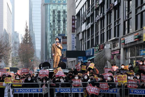 Bae In-kyu, the head of Man on Solidarity, one of South Korea’s most active anti-feminist groups, leading a rally in Seoul last month. “Feminists are a social evil,” he has said.Credit...Woohae Cho for The New York Times