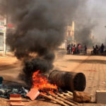 Demonstrators block a main road in Khartoum, the capital of Sudan, during a general strike. Photograph: Anadolu Agency/Getty Images