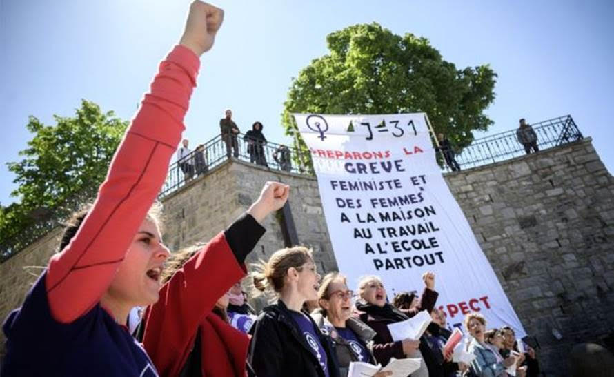 Women demonstrate in Lausanne ahead of a nationwide strike in Switzerland – Getty Image