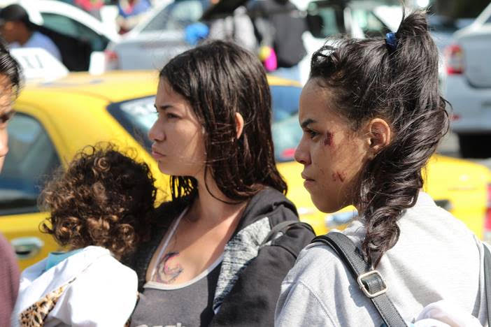These young women had been robbed while travelling from Valencia, Venezuela to Ecuador. (Joshua Collins/TNH)